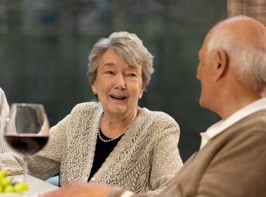 senior-female-and-male-drinking-wine-mobilebanner