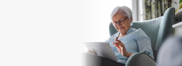 Senior woman looking at her ipad - Right Panel