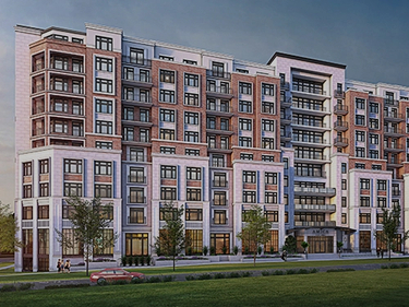 An exterior shot of Amica Glen Abbey, which is multi-level, two-colour building.