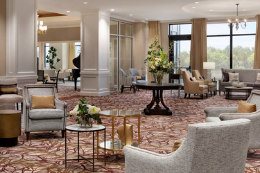 The Amica Pickering lounge offers lots of seating and room to listen to a piano.