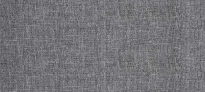 An image of a grey textile used as a desktop banner.