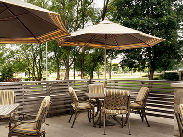 Amica Riverside senior living residence outdoor patio.
