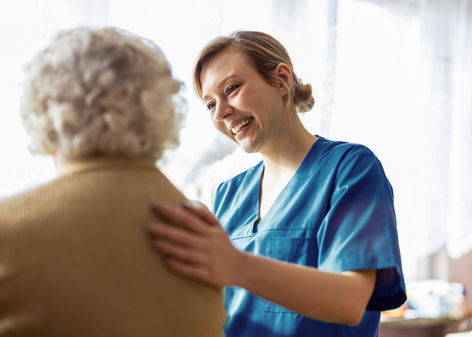 Amica Conversations how to find the right Memory Care community A friendly personal support worker helping an senior woman