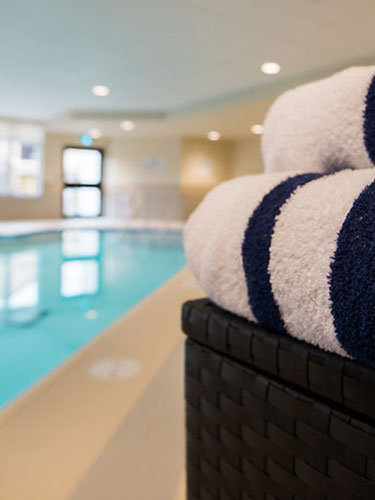 Indoor saltwater pool at Amica Stoney Creek senior living residence.