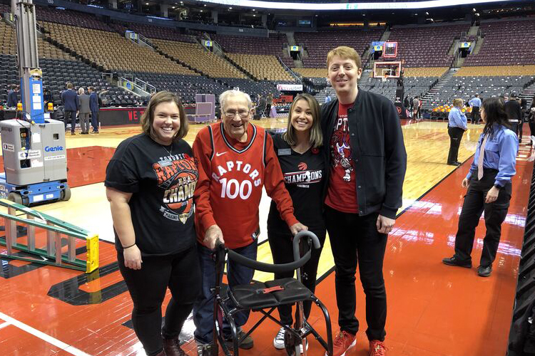 An Amica Whitby resident enjoying a Toronto Raptors game for his birthday