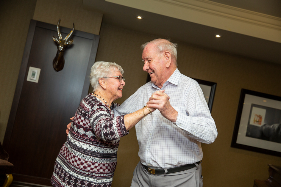 Jan and Chris share a romantic dance at Amica Aspen Woods