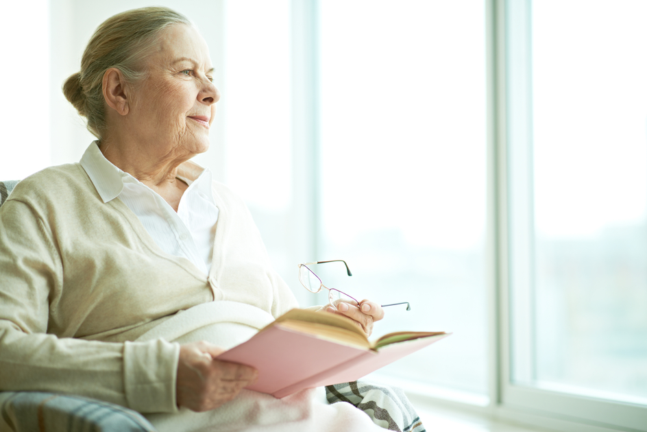 Image for Conversations Article Is your parent's health declining. Amica senior looking out at window.