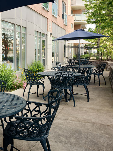 Beautiful outdoor patio at Amica Erin Mills senior living residence.