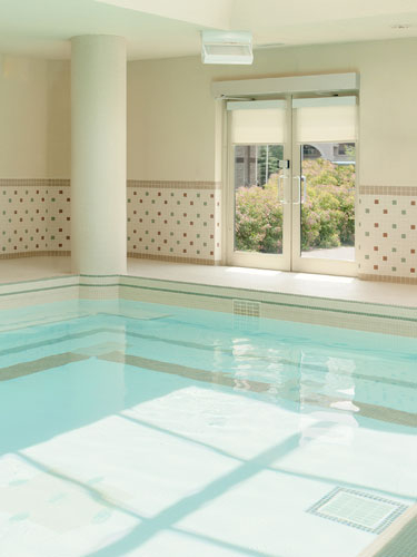 Indoor swimming pool at Amica Dundas senior living residence.