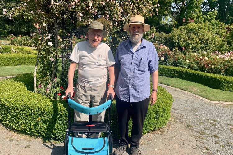 An Amica resident participating in a gardening masterclass in the rose garden