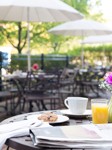 Outdoor dining patio at Amica Westboro Park senior living residence.