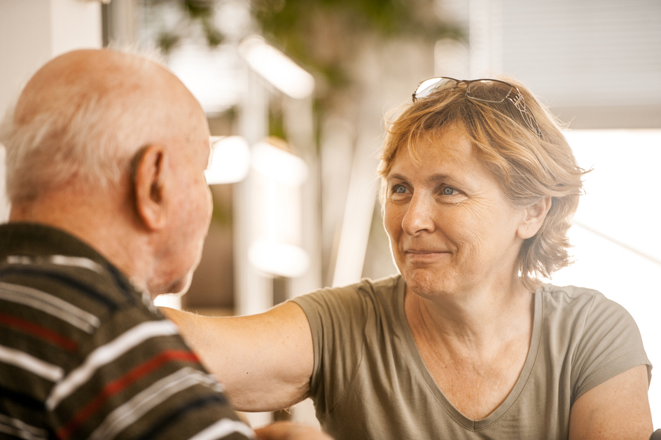 Daughter visiting her father at an Amica Senior Lifestyles residence